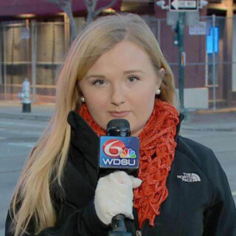 Student Lily Cummings with microphone