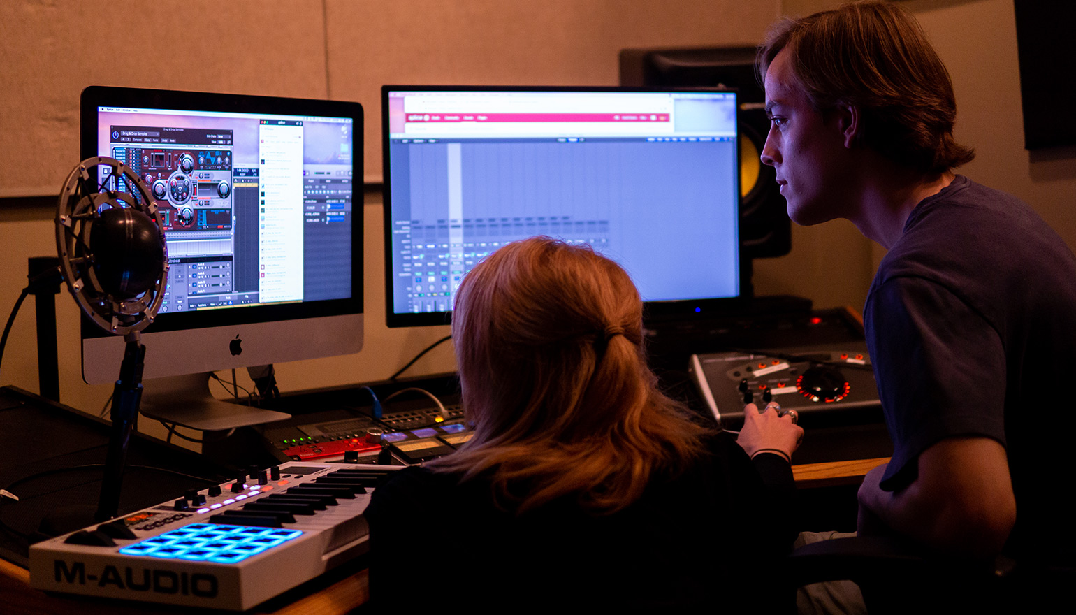 Two students looking at screen