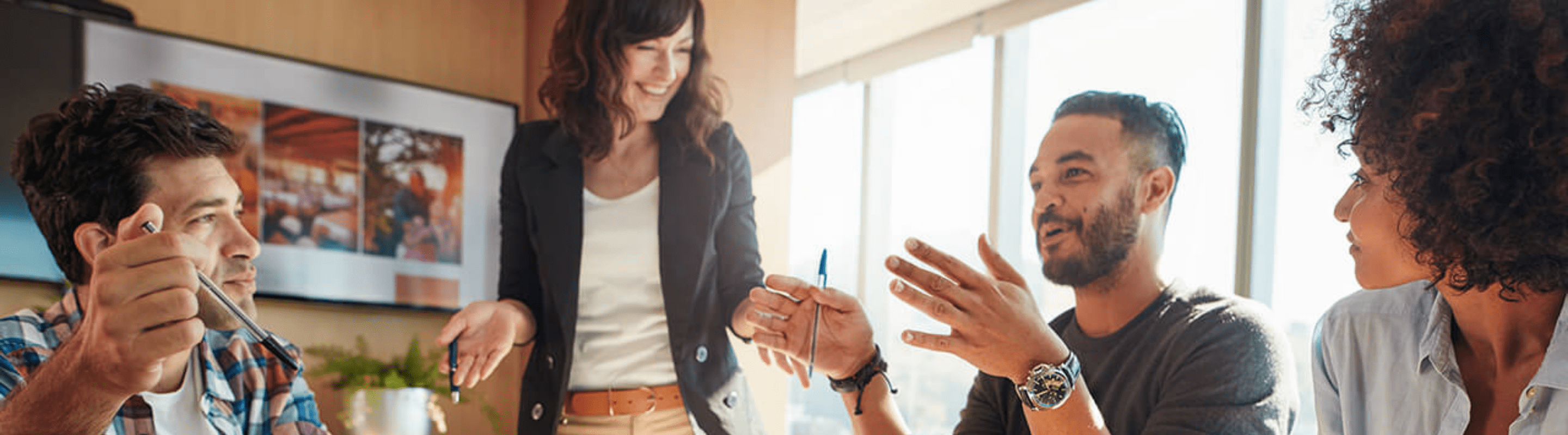 online master of science in marketing students working on a group project.