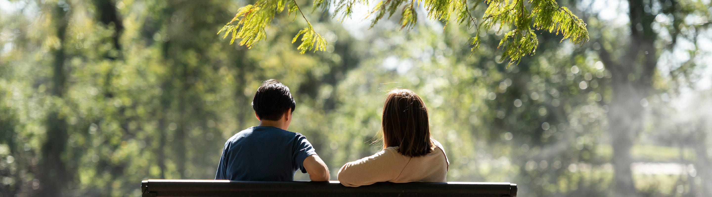 Folks sitting on bench thinking about business